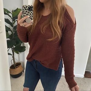 Sweater with shoulder cutouts